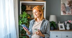 cheerful woman standing by