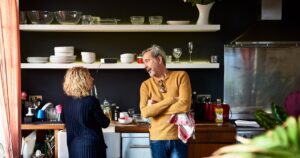 married couple at kitchen