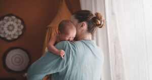 mother with crying newborn